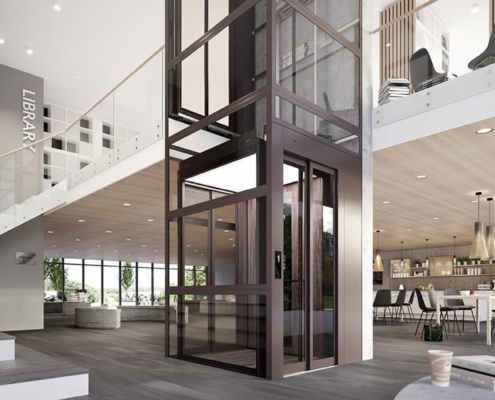 Metal finish and glass elevator in library