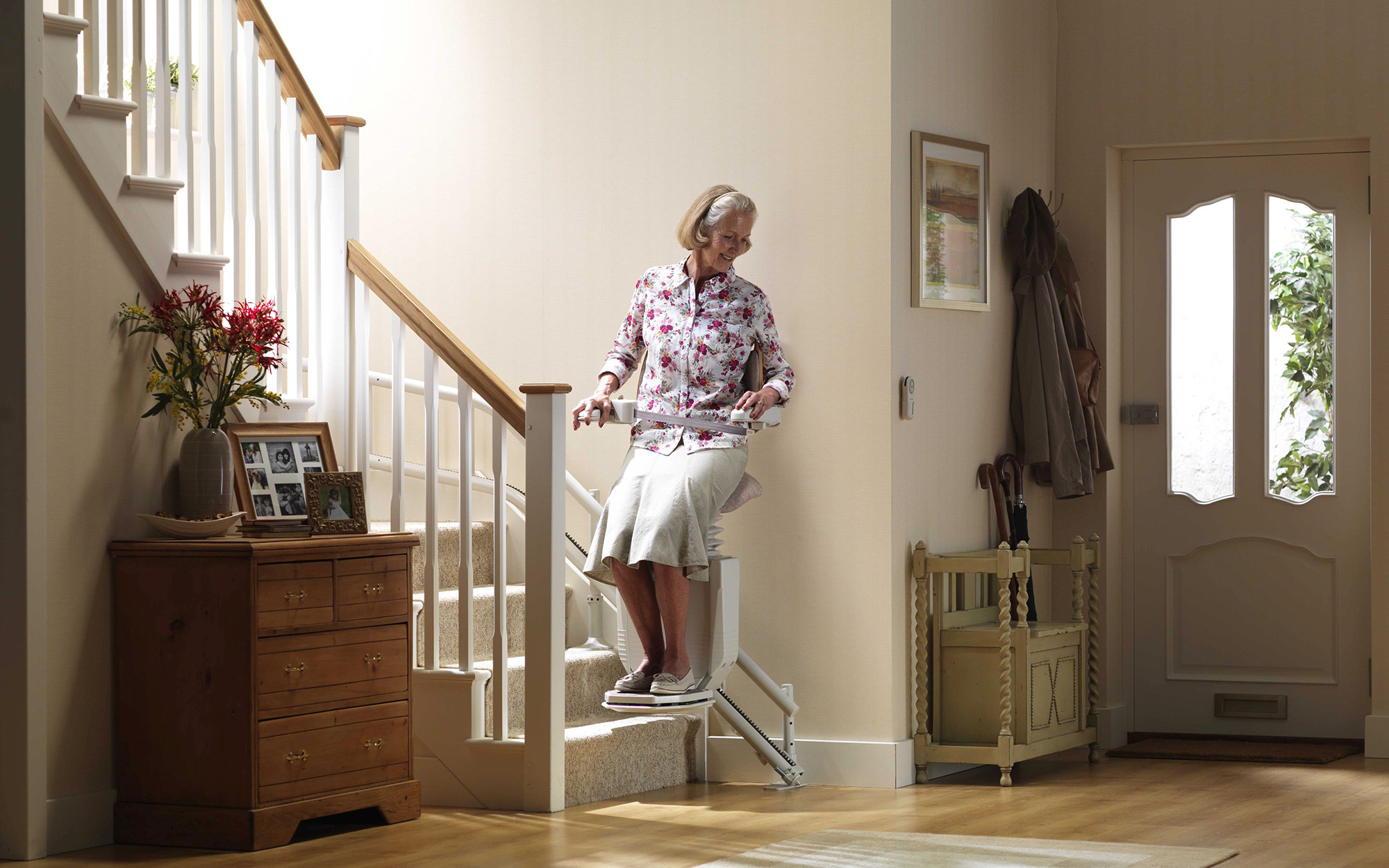 Woman on curved stairlift