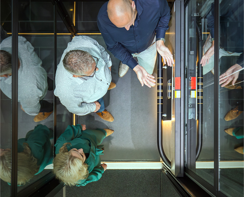 People looking at elevator