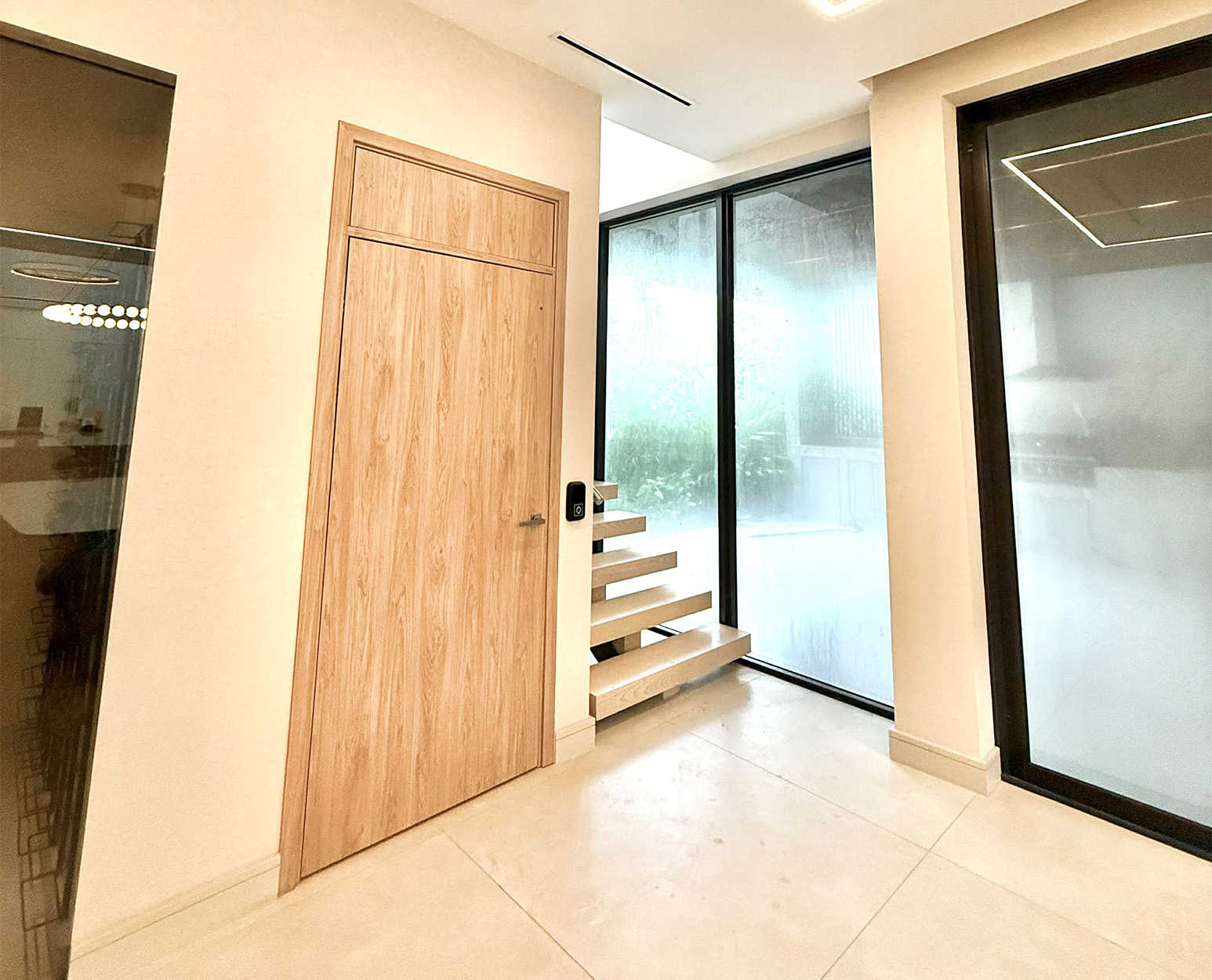 Elevator next to stairs in home