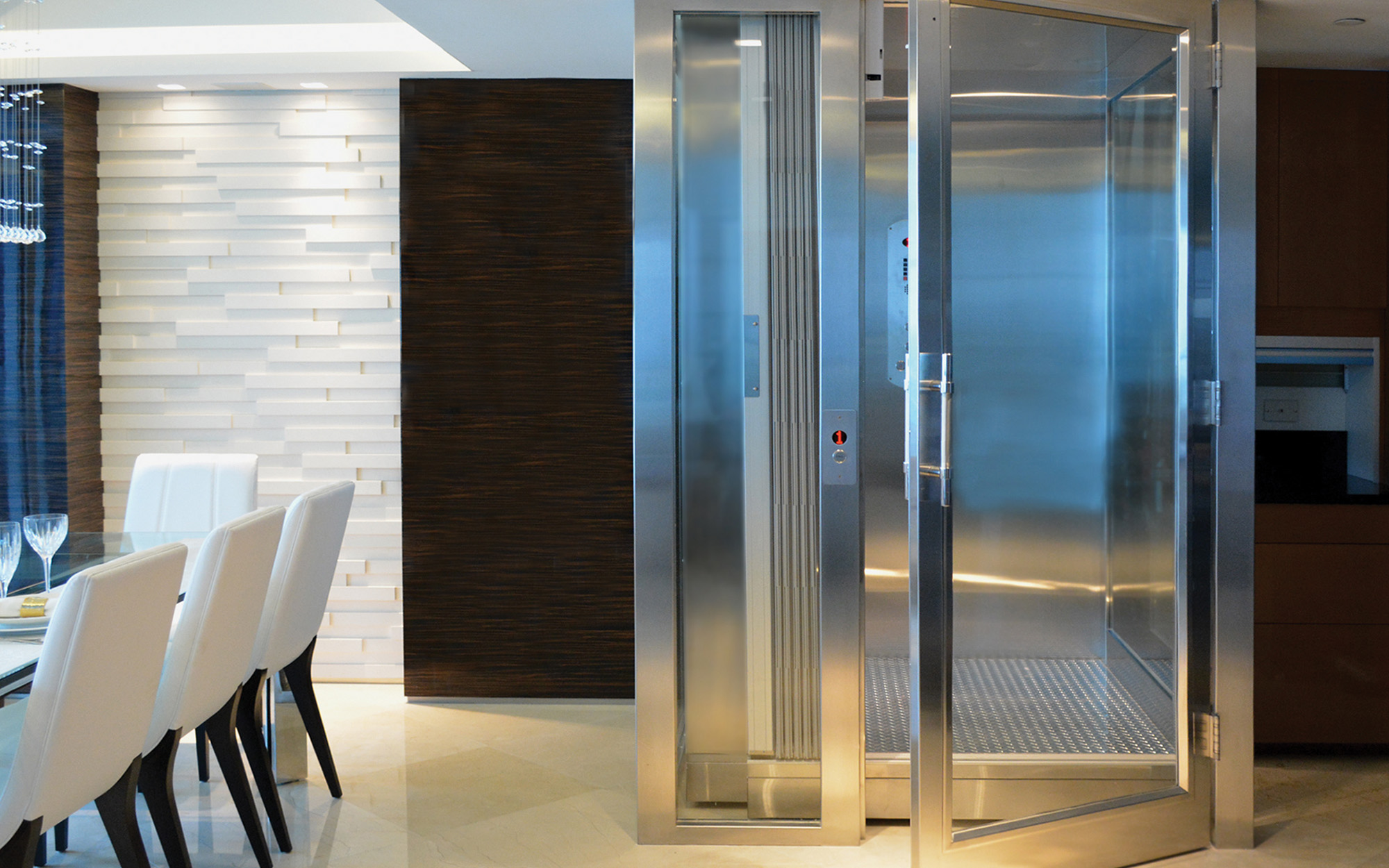 Custom glass elevator in home
